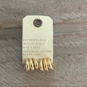 Anthropologie Shiny Gold triple Huggies hoop earrings